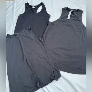 Lot of three lululemon tanks black size 6 guc